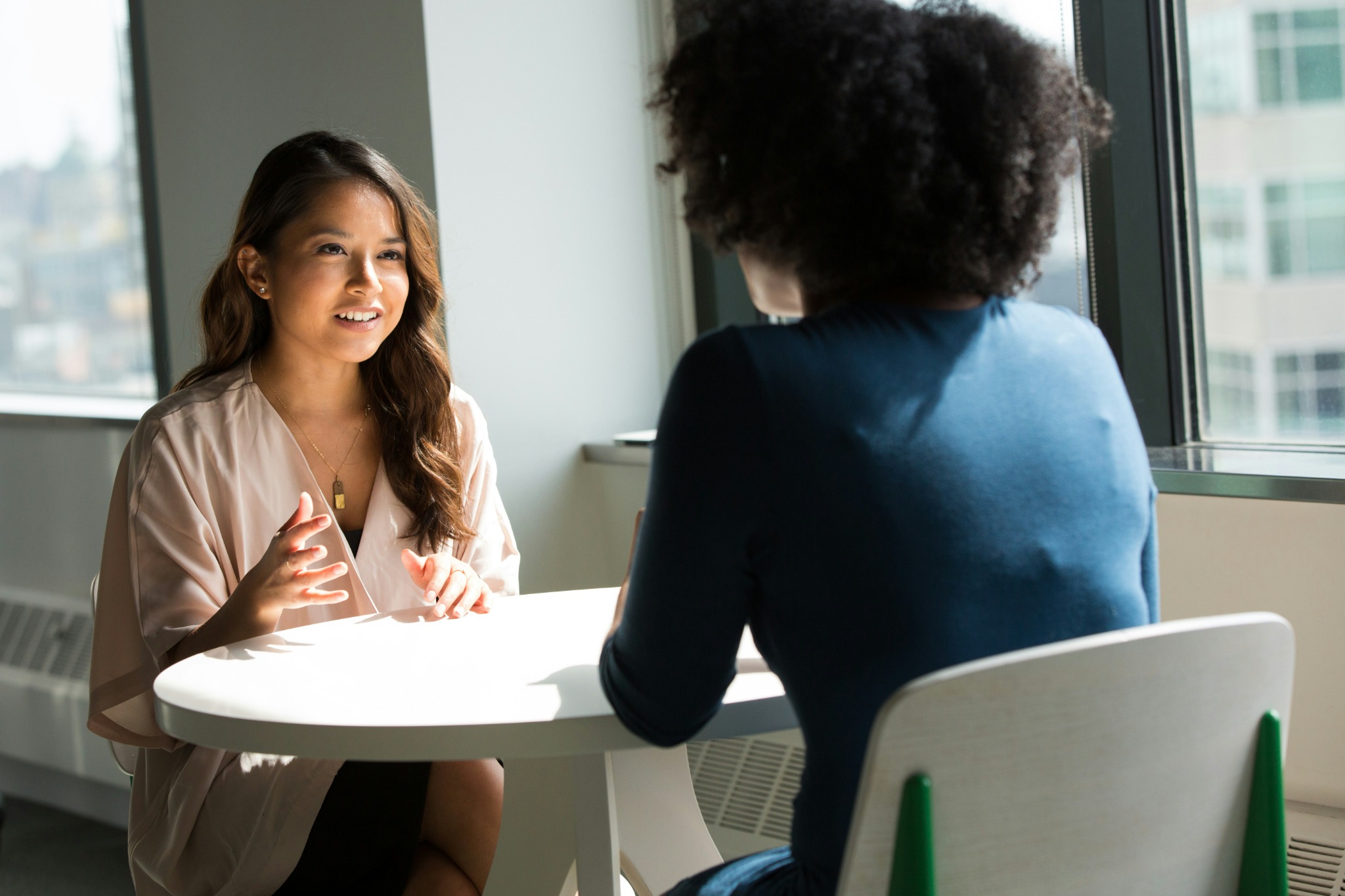 Two professionals discussing strategy during a one-on-one consultation